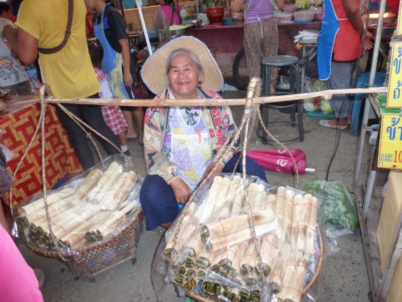 A hardworking but happy street seller